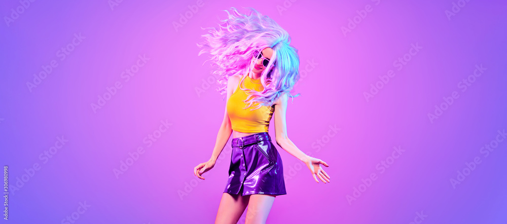 Adorable Fashion woman in party outfit dance, Trendy neon light hairstyle.  Night club Music vibes, gel filter. Excited shapely beautiful girl dancing.  Pop Art fashionable creative neon color. Stock-Foto | Adobe Stock