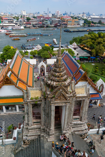 Wat Arun mondot and sala in front of Chao Phraya River, Bangkok, Thailand