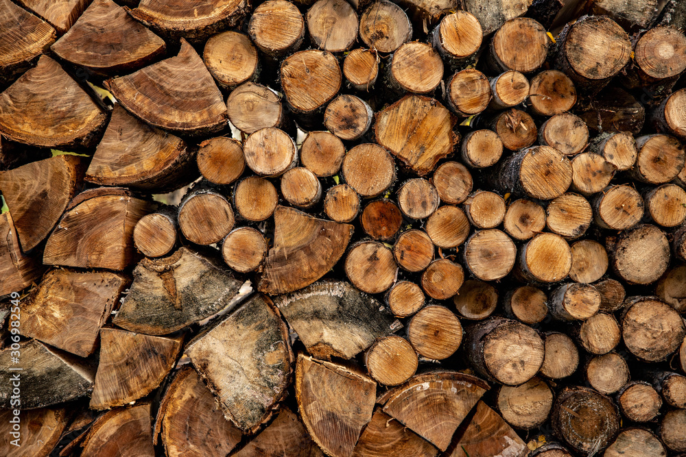 neatly stacked chopped firewood, background image texture neatly stacked chopped firewood, background image texture