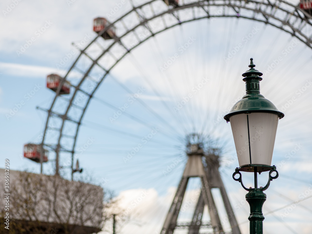 Lamp in front of Wiener Riesenrad on a cloudy day in winter