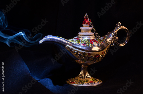 magic Aladdin Genie lamp with a smoke photo
