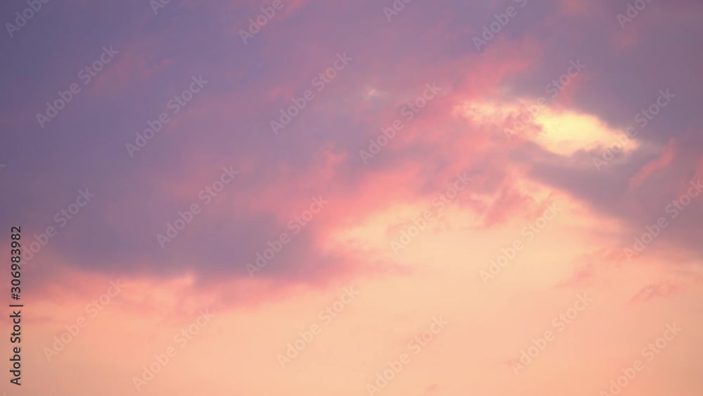 TimeLapse. 4K. Dramatic sunset. Fast moving purple, pink, red, orange, blue clouds in the sky. Natural colors. Evening sky. Time Lapse Ultra HD stock footage
