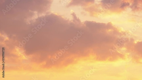 Time Lapse. Dramatic sunset. Fast moving golden, orange, red, pink, purple clouds in the sky. Natural colors. Evening sky. TimeLapse Ultra HD stock footage