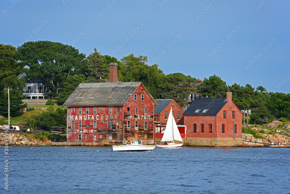 Obraz premium Tarr and Wonson Paint Manufactory is one of the most famous landmarks on the North Shore Massachusetts in Gloucester Harbor, Massachusetts MA, USA.