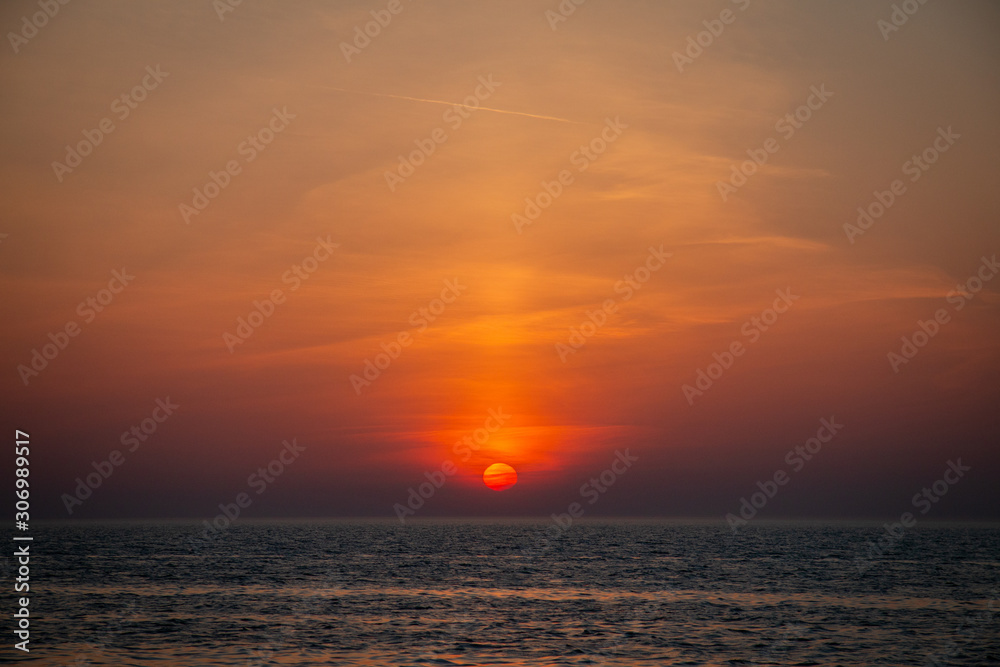 Red sun sunset at sea 