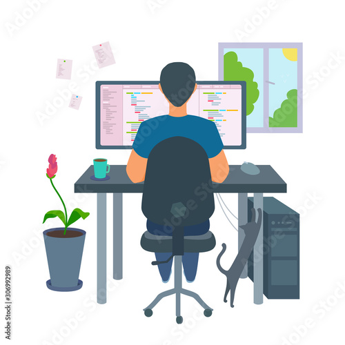 A freelancer programmer coding a program. Home office. 