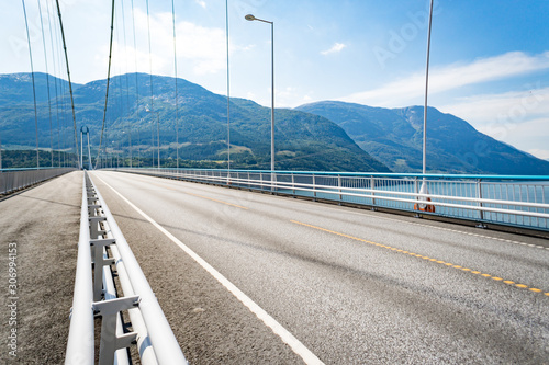 Hardanger Bridge. Hardangerbrua connecting two sides of Hardangerfjorden. Norway Hardangerfjord Hardanger bridge. newly built Hardangerbrua bridge close to Ulvik in Western Norway photo