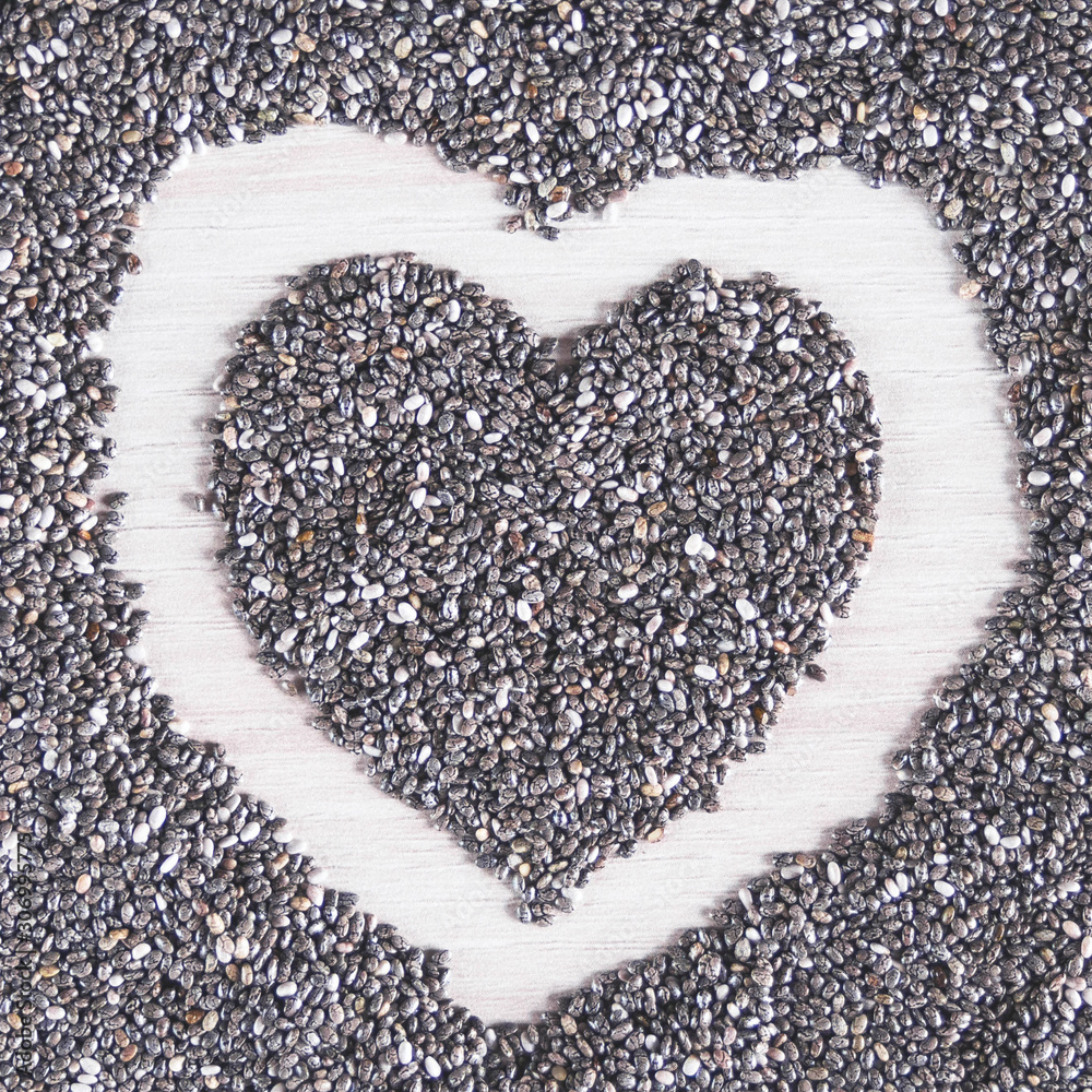 Edible seeds of chia, Salvia hispanica, a flowering plant of the mint family. A popular healthy food product. Edible seeds of chia, Salvia hispanica, a flowering plant of the mint family. A popular healthy food product.