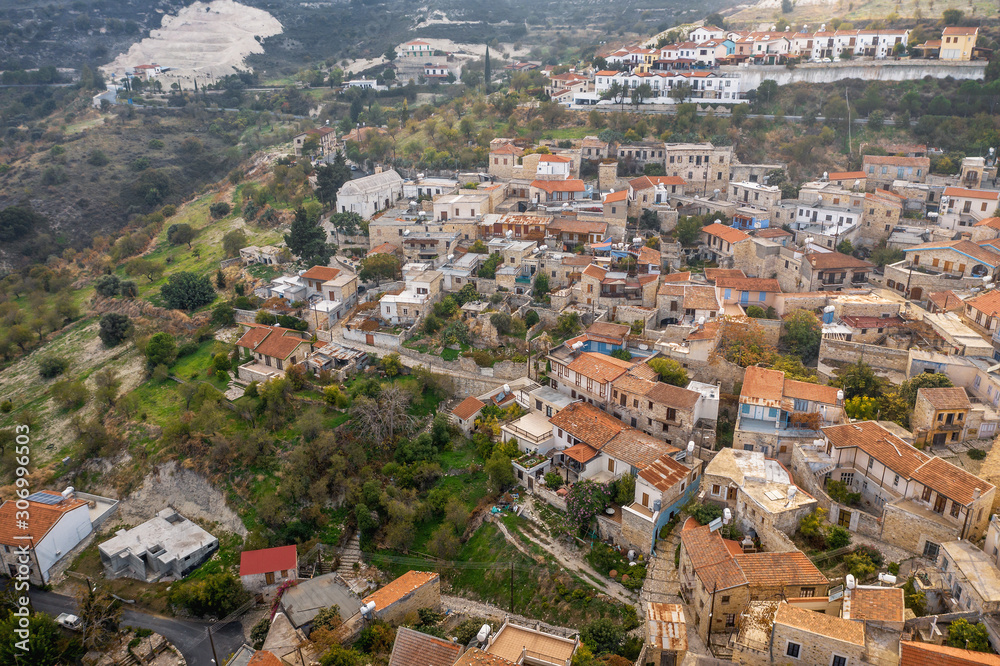 Aerial view of Pano Lefkara village in Larnaca district, Cyprus. Famous old village in mountains with orange roofs.