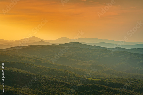 Beautiful sunset over the hills near Montalcino. Travel destination Tuscany  Val d Orcia  Italy
