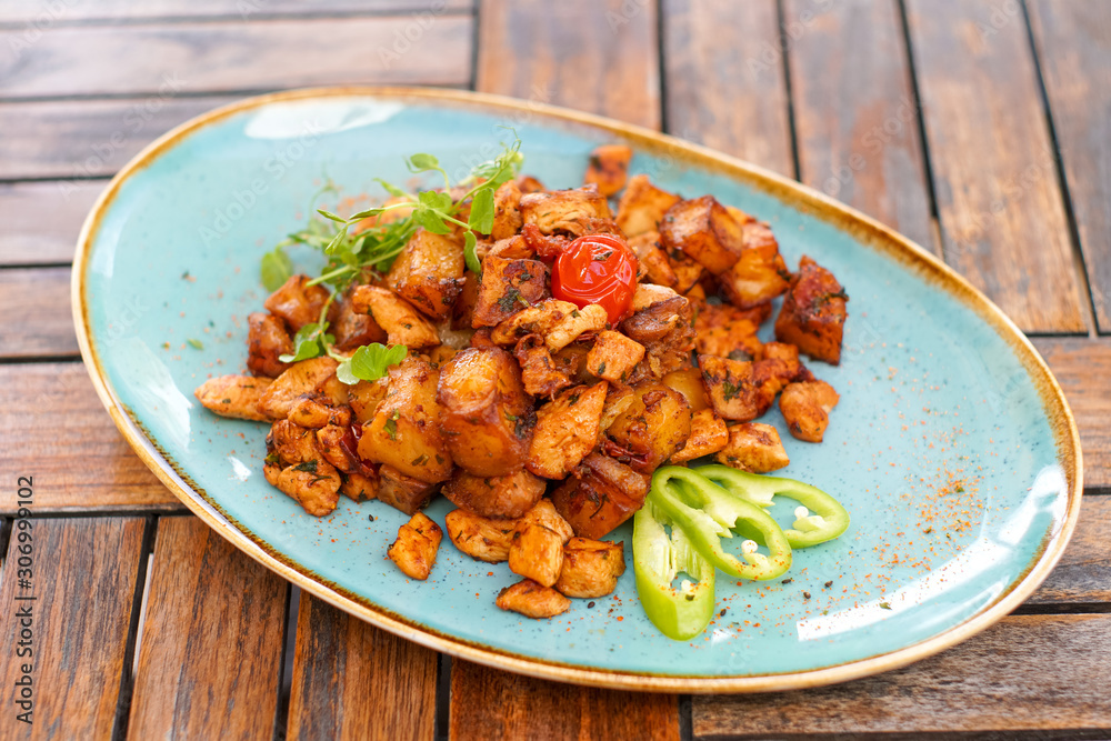 Chicken dish on a restaurant table Chicken dish on a restaurant table