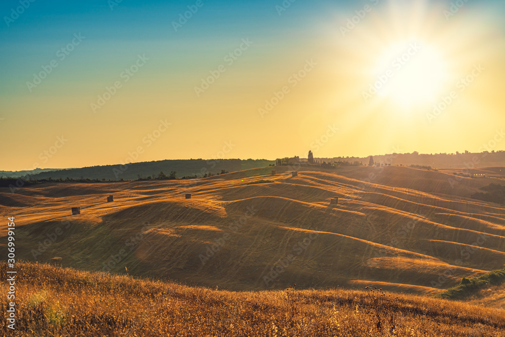 Fascinating view of the morning sun over Pienza. Travel destination Tuscany, Val d'Orcia, Italy