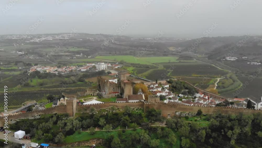 Obidos, castle town in Portugal, old walled city by drone, Aerial 4k Obidos, castle town in Portugal, old walled city by drone, Aerial 4k