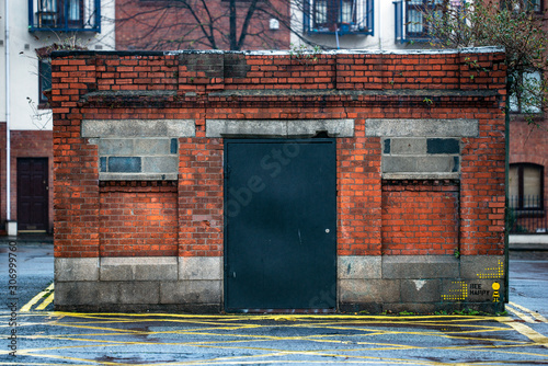 Photography old door in brickwall, dublin city