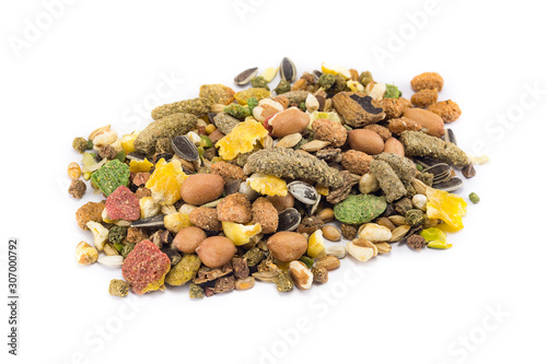 a variety of nutritious, balanced granulated food for rodents isolated on white background