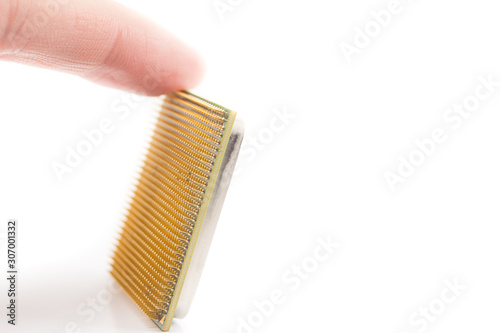 computer CPU in hand close-up isolated on white background