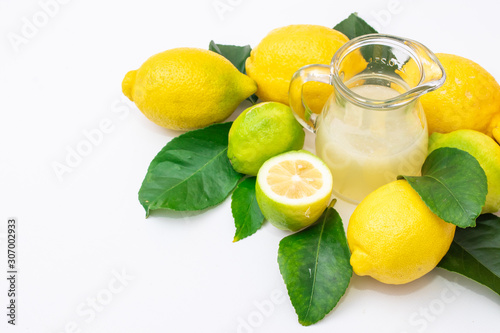 top view of natural lemons and lemon juice isolated