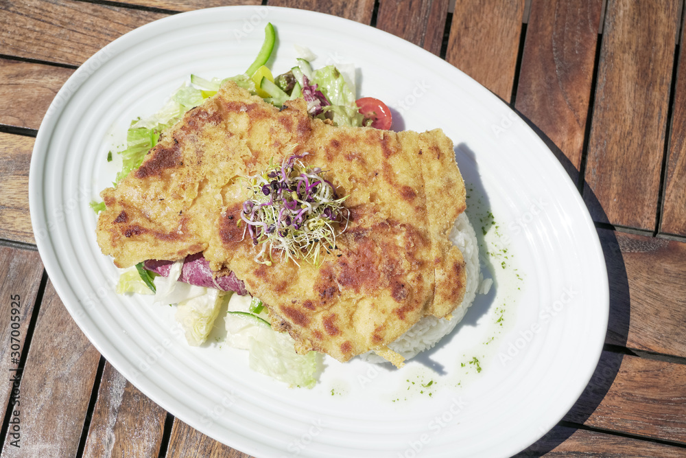 Chicken dish on a restaurant table Chicken dish on a restaurant table
