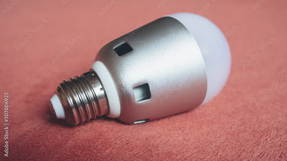 Light bulbs on a soft fluffy peach-colored background Light bulbs on a soft fluffy peach-colored background