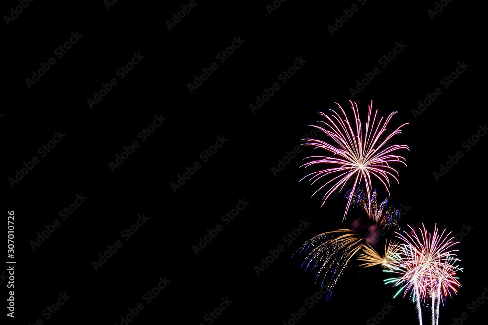 Fireworks display with black background and copy space Fireworks display with black background and copy space