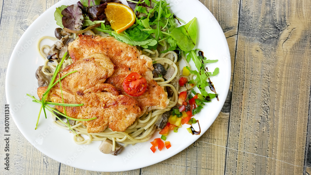 Chicken dish on a restaurant table Chicken dish on a restaurant table