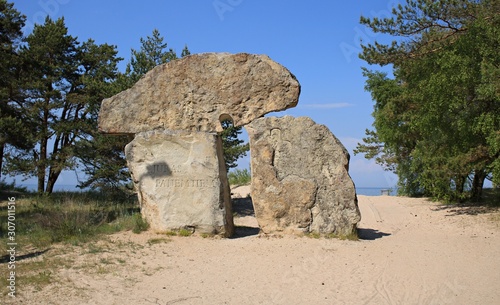 Stone Monument TAKEN BY THE SEA at Cape Kolka in Latvia. June 2019