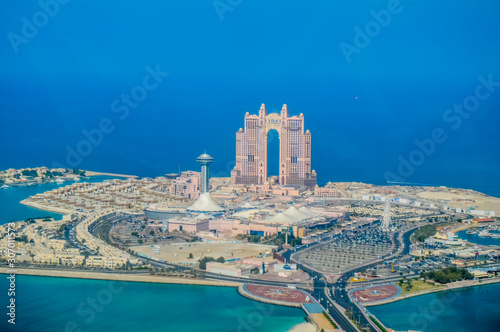 Bird's eye and aerial drone view of Abu Dhabi city from observation deck