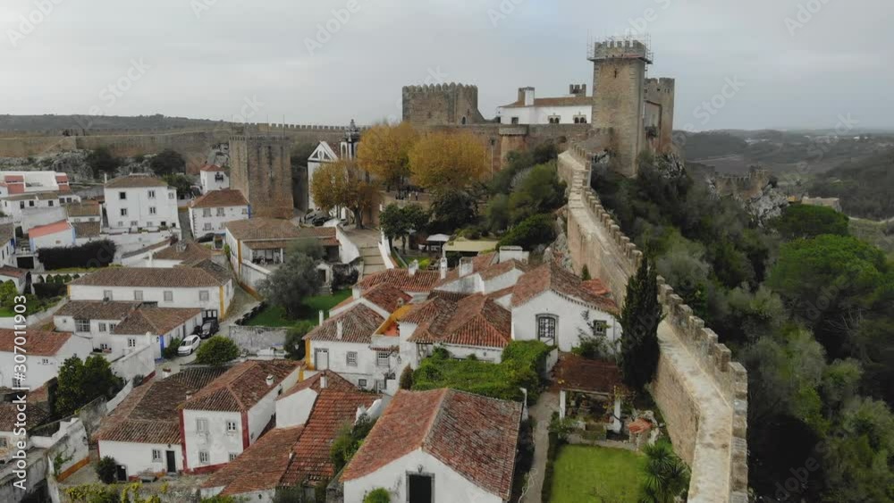 Obidos, castle town in Portugal, old walled city by drone, Aerial 4k Obidos, castle town in Portugal, old walled city by drone, Aerial 4k