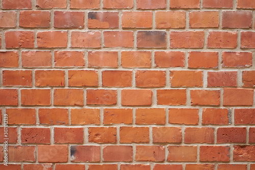 Red brick wall background texture.