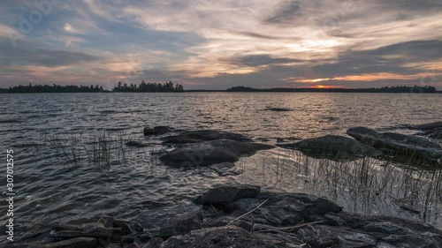 A sunset time lapse taken from a small rocky island on Eagle Lake located in Northwest Ontario, Canada.