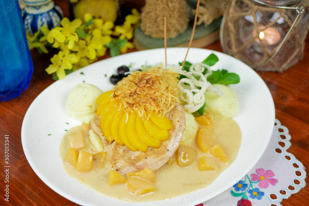 Chicken dish on a restaurant table Chicken dish on a restaurant table