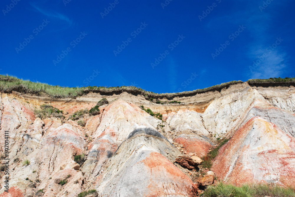 photo of colorful cliffs with deep blue sky