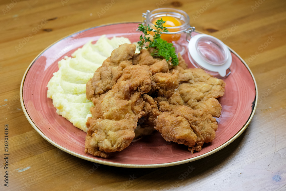 Chicken dish on a restaurant table Chicken dish on a restaurant table