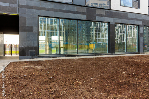 Panoramic window of modern residential building view outside. Insulating glass (glazing, pane). Storm windows. Ground floor apartment. first for shops, offices. commercial premises. Rainscreen. Door photo