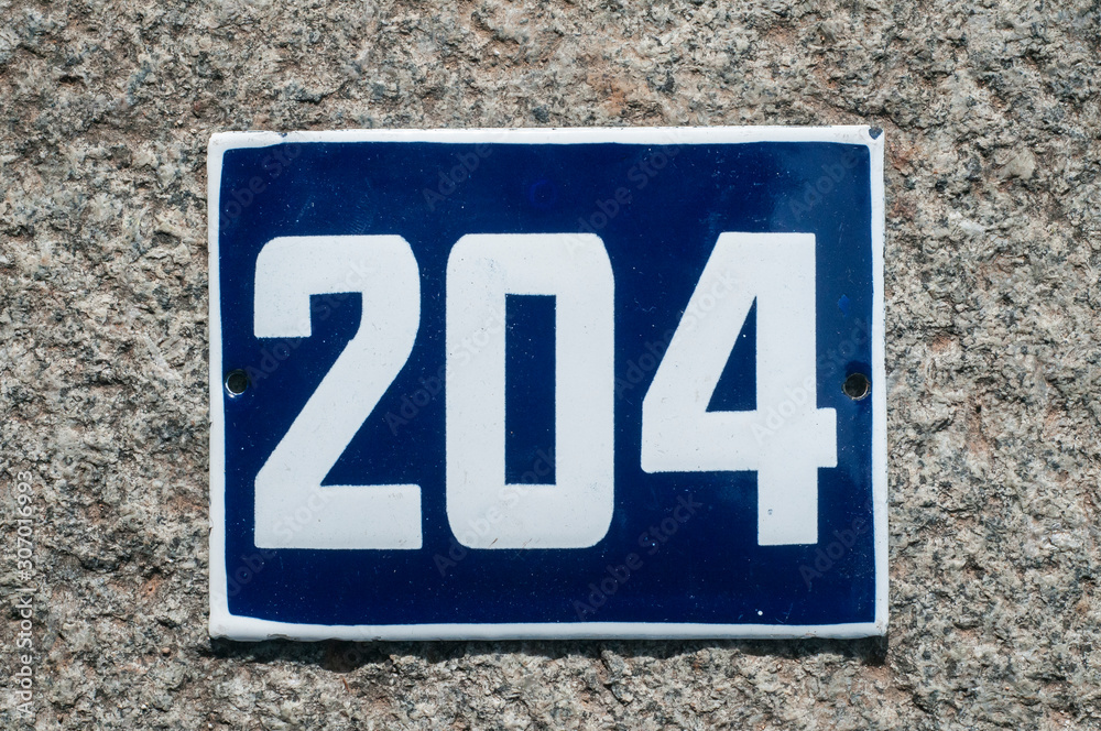 Weathered grunge square metal enameled plate of number of street address with number 204 closeup Weathered grunge square metal enameled plate of number of street address with number 204 closeup