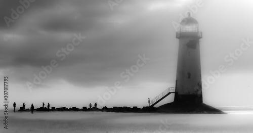 silhouettes at the lighthouse