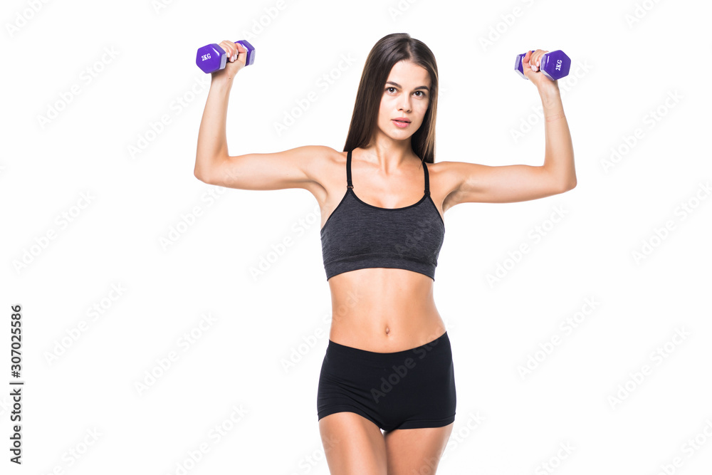Young fit woman lifting dumbbells isolated on white background Young fit woman lifting dumbbells isolated on white background