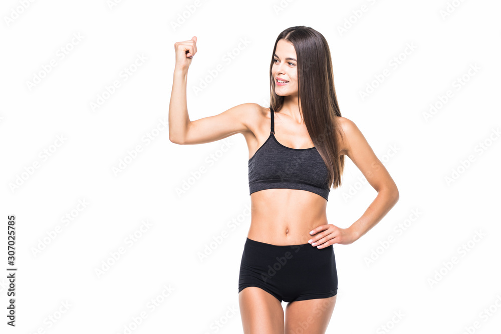 Cheerfully smiling sporty woman demonstrating biceps, isolated on white background Cheerfully smiling sporty woman demonstrating biceps, isolated on white background