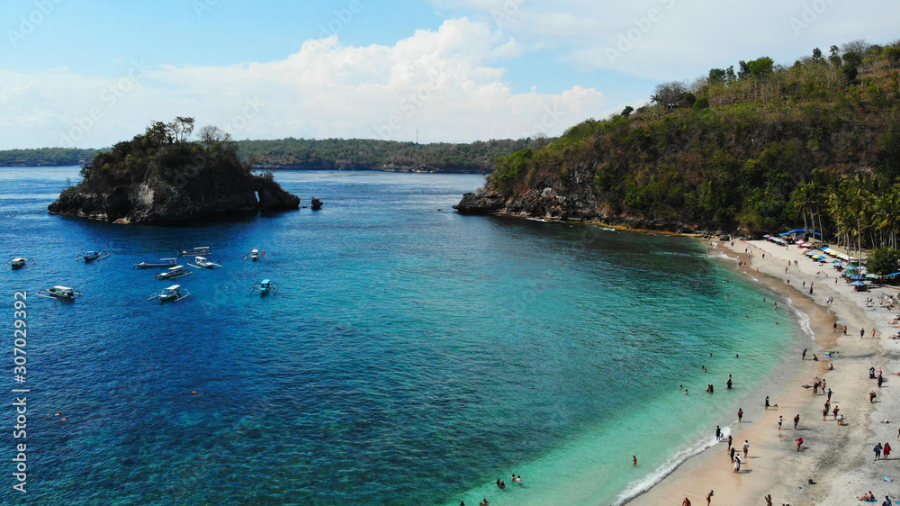 Tropical island in the sea, Crystal Beach, West Coast of Nusa Penida Island, Bali.