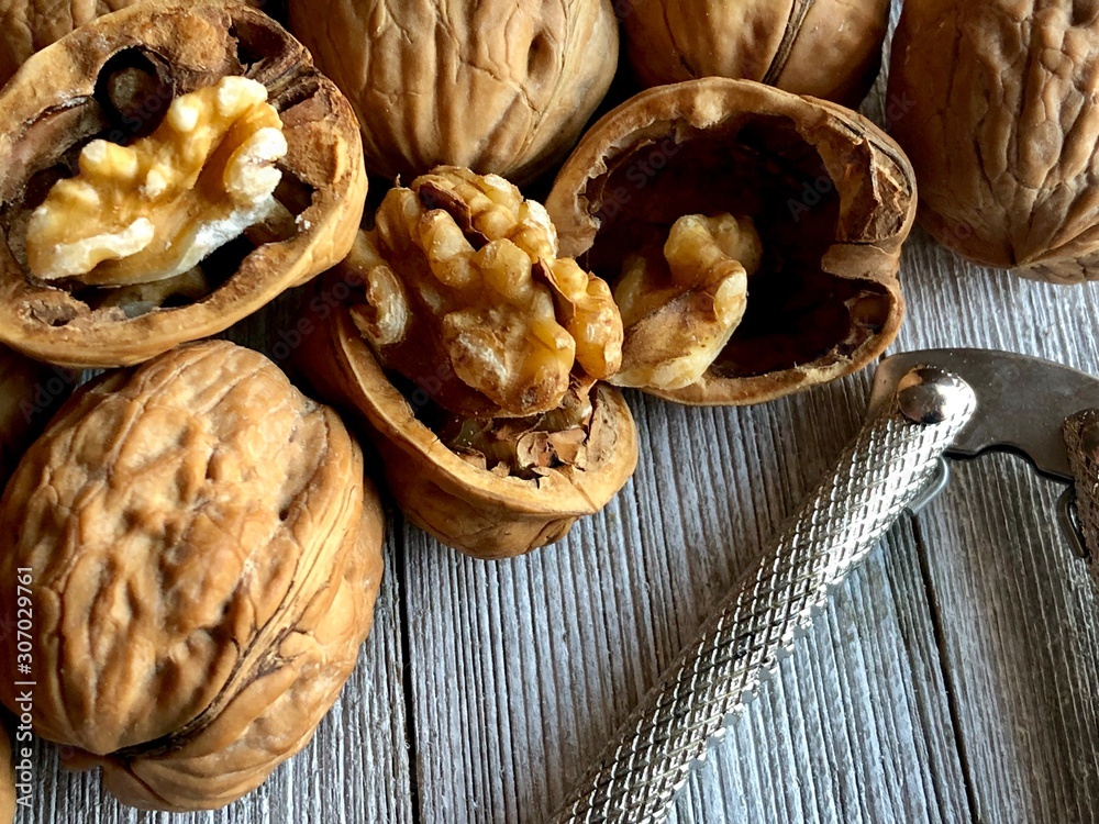 walnuts on wooden table walnuts on wooden table