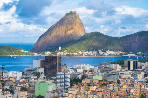 Beautiful view of Sugar Loaf Mountain and Favela Santo Amaro from Ruins Park (Parque das Ruinas) viewpoint - Rio de Janeiro, Brazil photo