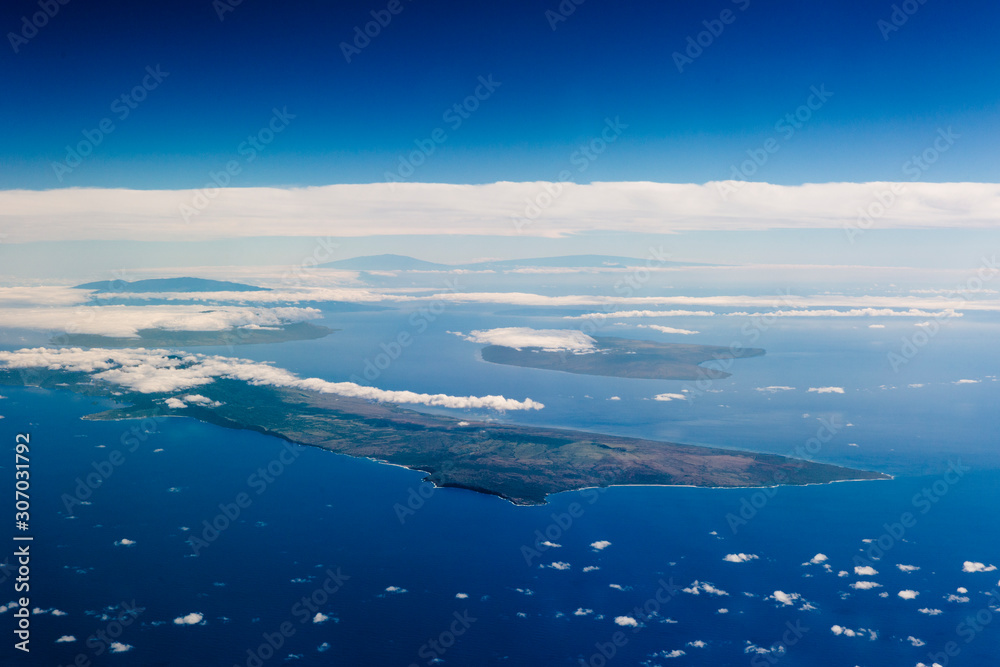 Aerial view looking at the Hawaiian Islands from an airplane