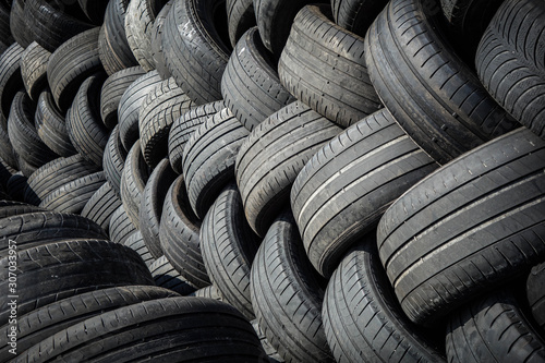 Old tires collected outdoors for recycling