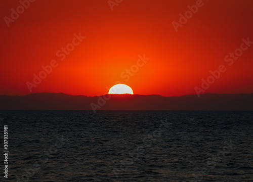 sunset over the sea © James