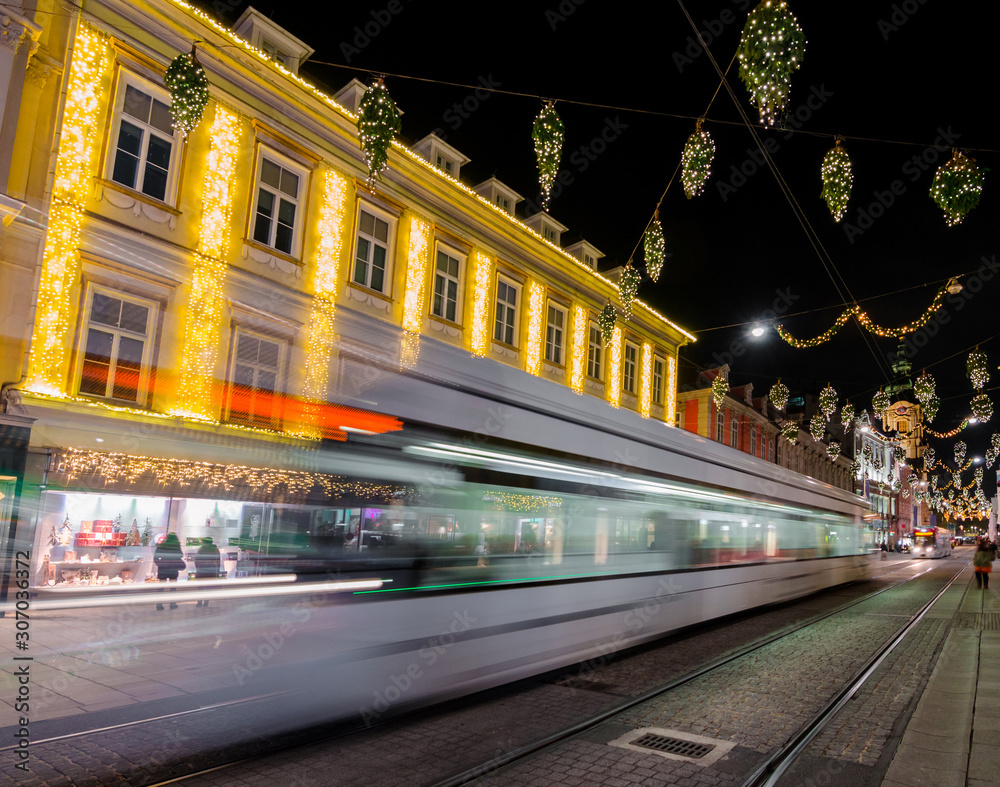 Beautiful Christmas decorations on Herrengasse street, at night, in the city center of Graz, Styria region, Austria