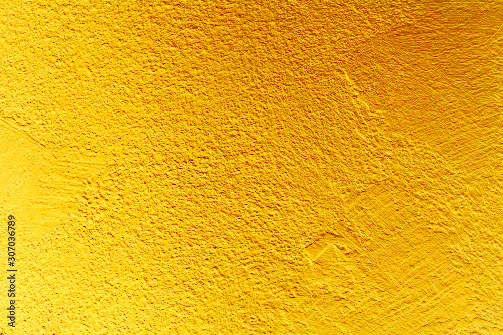 Golden cement wall background Golden cement wall background