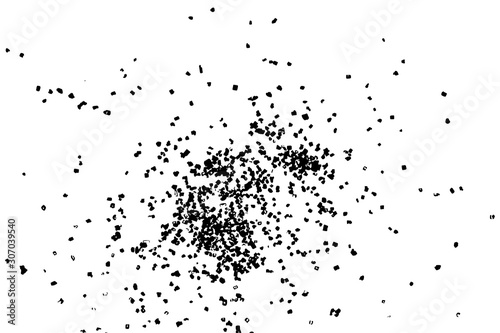 Abstract grainy texture isolated on white background. Top view. Dust, sand blow or bread crumbs.Silhouette of food flakes such as salt or almond or wheat flour spread on the flat surface or table.
