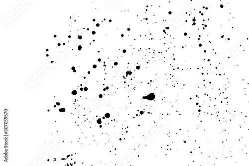 Grainy grunge abstract texture on a white background. Paint spray, drop. Black ink blow explosion on white background. Splatter of calligraphy ink in black on white background. Vector.