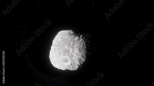 Fly by of Asteroid Apophis in space drifting with left side in sunlight. photo