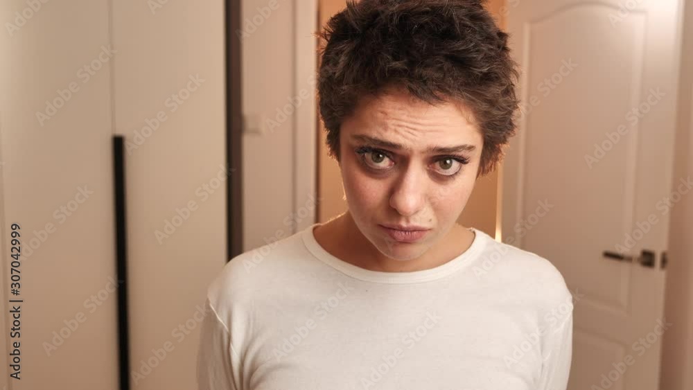 Frustrated embarrassed woman teenager experiences guilt, problems in ...
